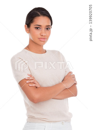Fashion, portrait and woman with arms crossed in studio with confidence, attitude and style on white background. Clothes, pride and female model posing with trendy, cool or neutral outfit choice Fashion, portrait and woman with arms crossed in studio with confidence, attitude and style on white background. Clothes, pride and female model posing with trendy, cool or neutral outfit choice 139920705