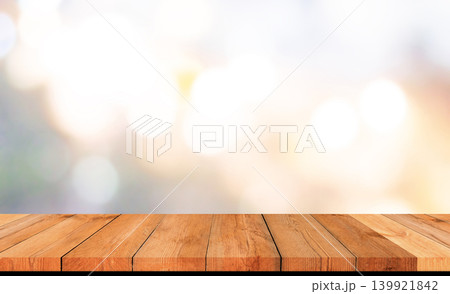 perspective wooden board over bright abstract background perspective wooden board over bright abstract background 139921842