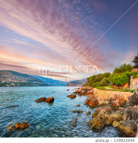 Amazing Tudjman bridge at sunset and rocky shore of Dubrovnik Amazing Tudjman bridge at sunset and rocky shore of Dubrovnik 139922049