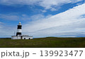 青空の草原と灯台（北海道能取岬灯台）右空き 139923477