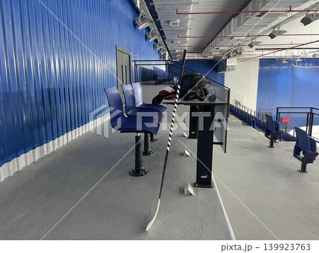 hockey stick and helmet for hockey on the ice arena 139923763