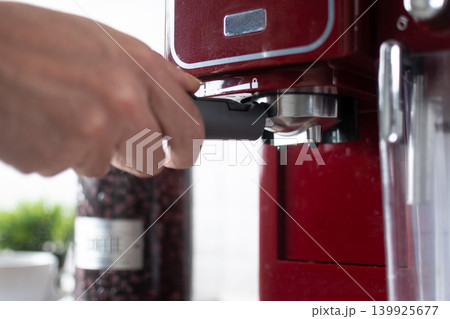 Preparing espresso coffee in a modern kitchen Preparing espresso coffee in a modern kitchen 139925677