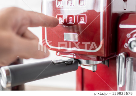 Preparing ground coffee for espresso machine at home Preparing ground coffee for espresso machine at home 139925679