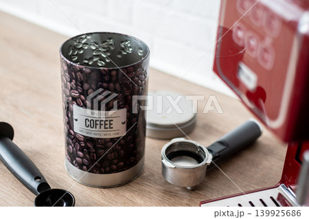Preparing ground coffee for espresso machine at home Preparing ground coffee for espresso machine at home 139925686
