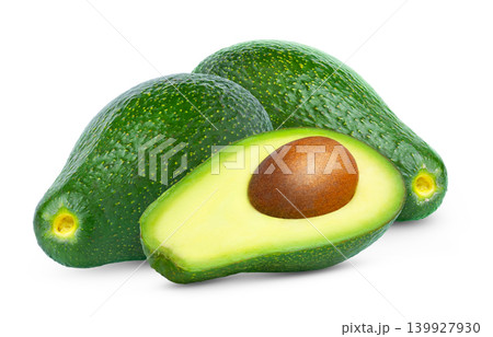 Fresh Fuerte sort avocado and half of ripe green avocado with brown clear seed isolated. Avocados with clipping path. 139927930