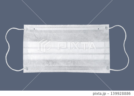 Medical protective face mask on a dark background 139928886