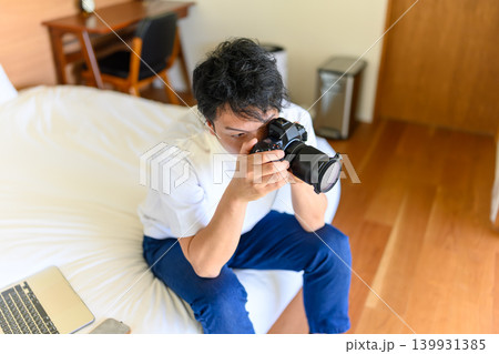 カメラを持つ男性 139931385