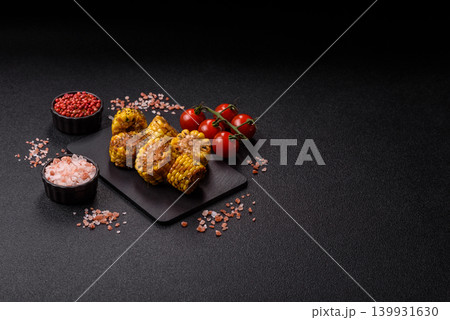 Corn chunks grilled or barbecued with salt and spices. Grilled corn Corn chunks grilled or barbecued with salt and spices. Grilled corn 139931630