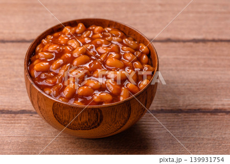 Beans in tomato sauce, a canned stew for the dinner table. Beans in tomato sauce Beans in tomato sauce, a canned stew for the dinner table. Beans in tomato sauce 139931754