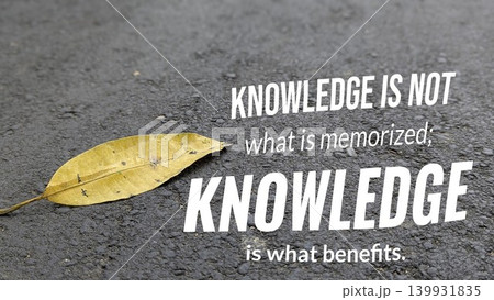 A single yellow leaf rests on a textured asphalt surface. The image features a quote in bold white text that reads "Knowledge is not what is memorized. Knowledge is what benefits." A single yellow leaf rests on a textured asphalt surface. The image features a quote in bold white text that reads "Knowledge is not what is memorized. Knowledge is what benefits." 139931835