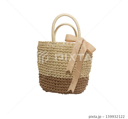 Woven straw tote bag with two-tone design isolated on white background Woven straw tote bag with two-tone design isolated on white background 139932122
