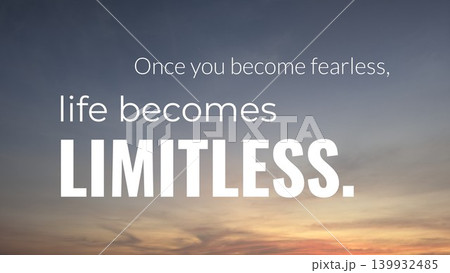 A stunning dawn sky with a blend of soft gray and orange colors. The text "Once you become fearless, life becomes limitless" is prominent in bold white font. 139932485