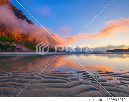 Norwegian arctic fjord at midnight sun. Horseid beach, Lofoten Islands, Norway.  139932613