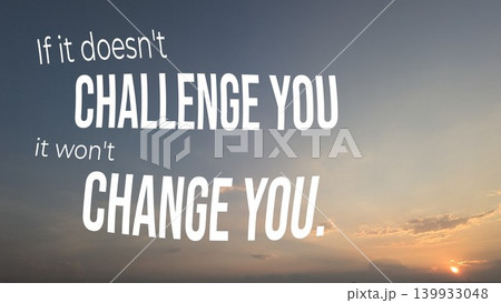 Inspirational quote "If it doesn't challenge you it won't change you" overlaid in white text on a subtle sunset sky background with soft blue and orange light and faint clouds. Inspirational quote "If it doesn't challenge you it won't change you" overlaid in white text on a subtle sunset sky background with soft blue and orange light and faint clouds. 139933048