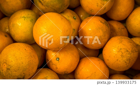 Mandarin orange fruit in the basket at the supermarket 139933175