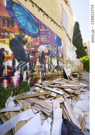 A vibrant mural depicting people with umbrellas on a rainy street covers a wall in Larnaka, Cyprus A vibrant mural depicting people with umbrellas on a rainy street covers a wall in Larnaka, Cyprus 139933754