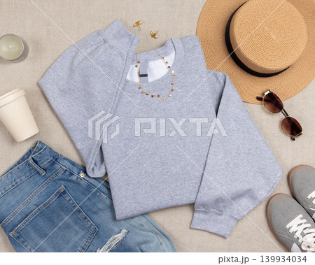 Blank grey unisex sweatshirt mockup, folded crewneck with copy space on front and both sleeves 139934034