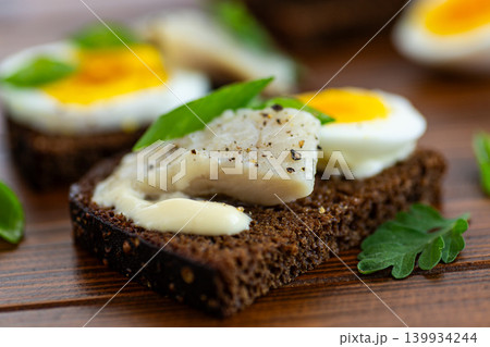 Homemade seafood snack with mayonnaise and herbs Homemade seafood snack with mayonnaise and herbs 139934244
