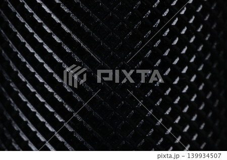 Black metal knurling texture background macro industrial steel close up Black metal knurling texture background macro industrial steel close up 139934507