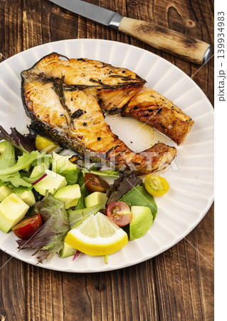 Healthy Trout Fillet Steak with Avocado and Green Salad Healthy Trout Fillet Steak with Avocado and Green Salad 139934983