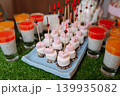 Catering table with marshmallows, canapes and jelly desserts 139935082