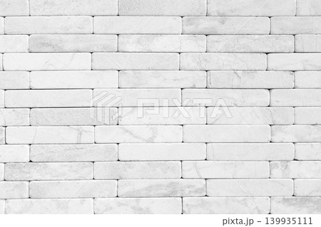 White and grey marble brick wall, beautiful pattern, abstract background White and grey marble brick wall, beautiful pattern, abstract background 139935111