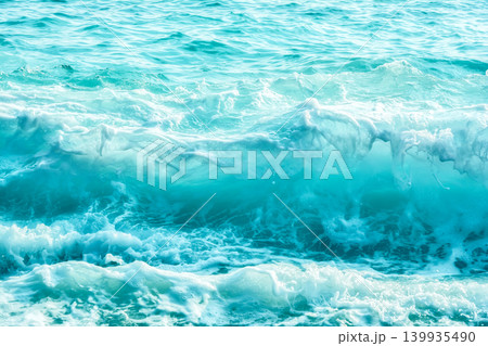 Turquoise blue ocean surface with waves and white foam, abstract sea water texture background, tropical marine nature 139935490
