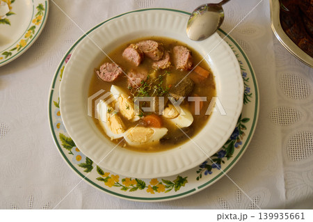 Traditional Meat Soup with Sausage Eggs and Vegetables 139935661