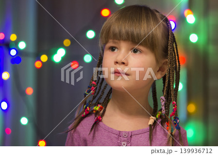 Portrait of pretty little girl with hair braids Portrait of pretty little girl with hair braids 139936712