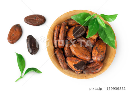 cocoa beans in wooden bowl isolated on white background. Top view. Flat lay 139936881