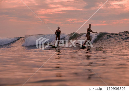 Friends And Partners Celebrate Final Sunset Ride With Mutual Happiness And Cheer 139936893