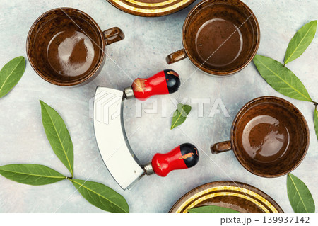 herbal tea concept with bay leaves and cups 139937142
