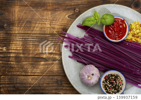 Vegan Purple Pasta Made from Sweet Potato Ingredients Vegan Purple Pasta Made from Sweet Potato Ingredients 139937159