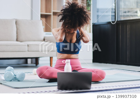 Women exercising in fitness studio yoga classes 139937310