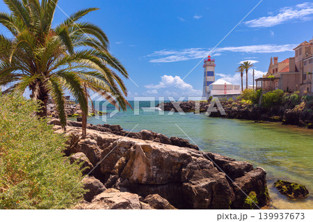 Santa Marta lighthouse on Atlantic rocky coast in Cascais Portugal 139937673