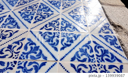 Perspective View of Traditional Cobalt Blue and White Azulejo Tiles with Reflective Glaze 139939087