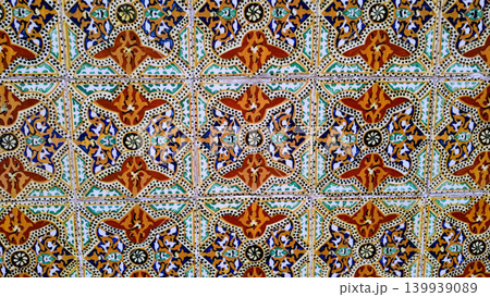 Wall of Traditional Multi-Colored Azulejo Tiles with Complex Geometric Patterns Wall of Traditional Multi-Colored Azulejo Tiles with Complex Geometric Patterns 139939089