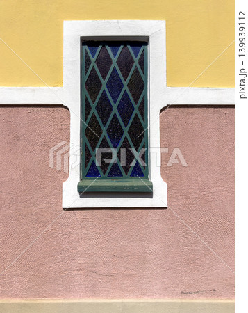 Colorful Traditional Architecture with Stained Glass Window and Stucco Wall Colorful Traditional Architecture with Stained Glass Window and Stucco Wall 139939112