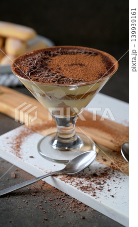 Traditional Italian Tiramisu Served in a Stemmed Glass with Dark Chocolate Shavings Traditional Italian Tiramisu Served in a Stemmed Glass with Dark Chocolate Shavings 139939161