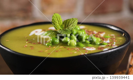 Green pea soup with seeds 139939441