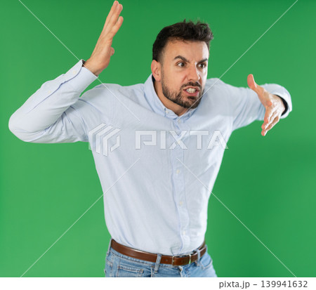 Screaming angry man green screen background chroma key 139941632