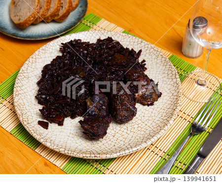 Delicious pork ribs stewed in gravy with sauerkraut close up 139941651