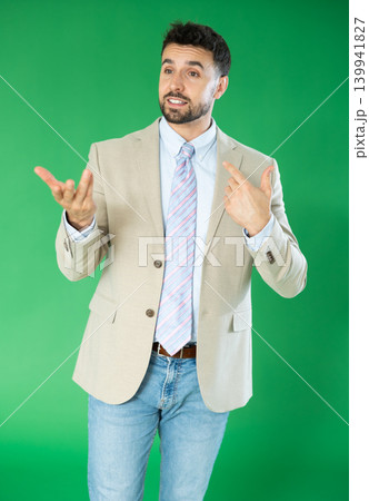 Adult man talking in front of green screen 139941827