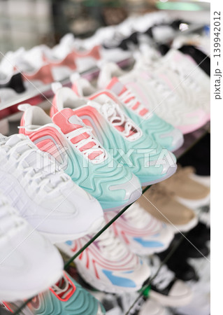 In shoe department stand womens trainers of latest summer collection 139942012