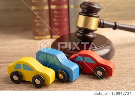 Hammer gavel judge with car vehicle accident, insurance coverage claim lawsuit court case. 139942724