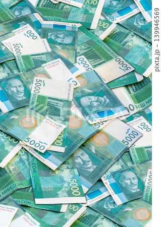 Close-up of Scattered 5000 Kyrgyzstan Som Banknotes Close-up of Scattered 5000 Kyrgyzstan Som Banknotes 139946569