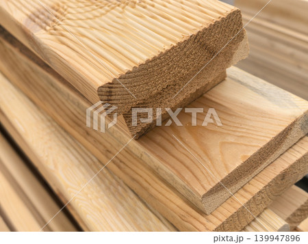 Macro Detail of Wood Grain and Growth Rings on a Timber Plank Macro Detail of Wood Grain and Growth Rings on a Timber Plank 139947896