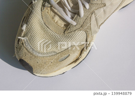 It is an old sneaker. 139948879