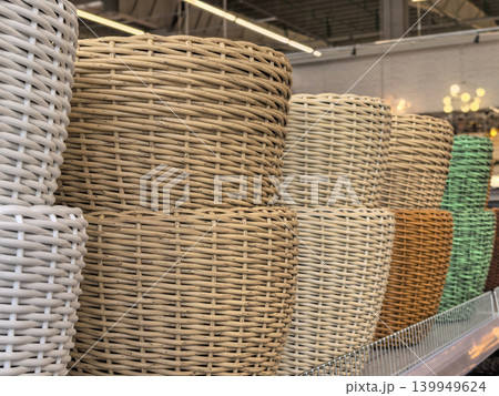 Assorted Colorful Woven Baskets on Retail Store Shelves 139949624