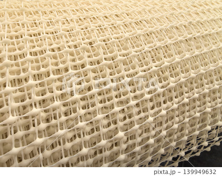 Natural rattan woven mesh texture closeup with...の写真素材 [139949632] - PIXTA